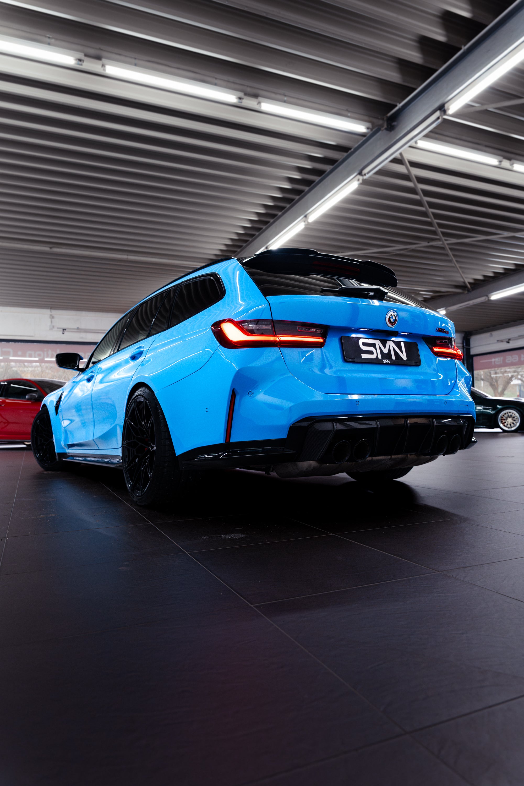 SMN Blau/Orangenes Schlüsselband passend zum BMW M3 G81 mit 700PS