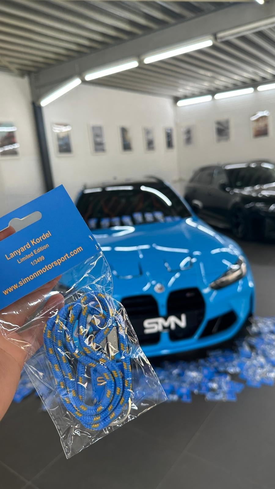 SMN Blau/Orangenes Schlüsselband passend zum BMW M3 G81 mit 700PS